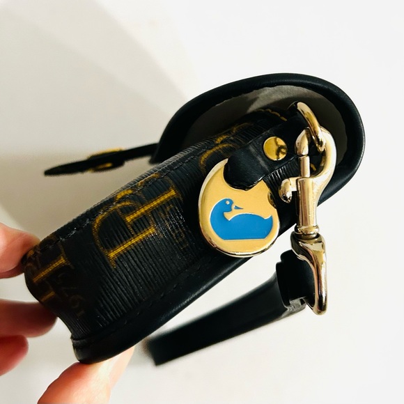 Dooney & Bourke Black and Gold Wristlet - Picture 7 of 9
